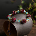 Pulsera de piedra en tono frambuesa