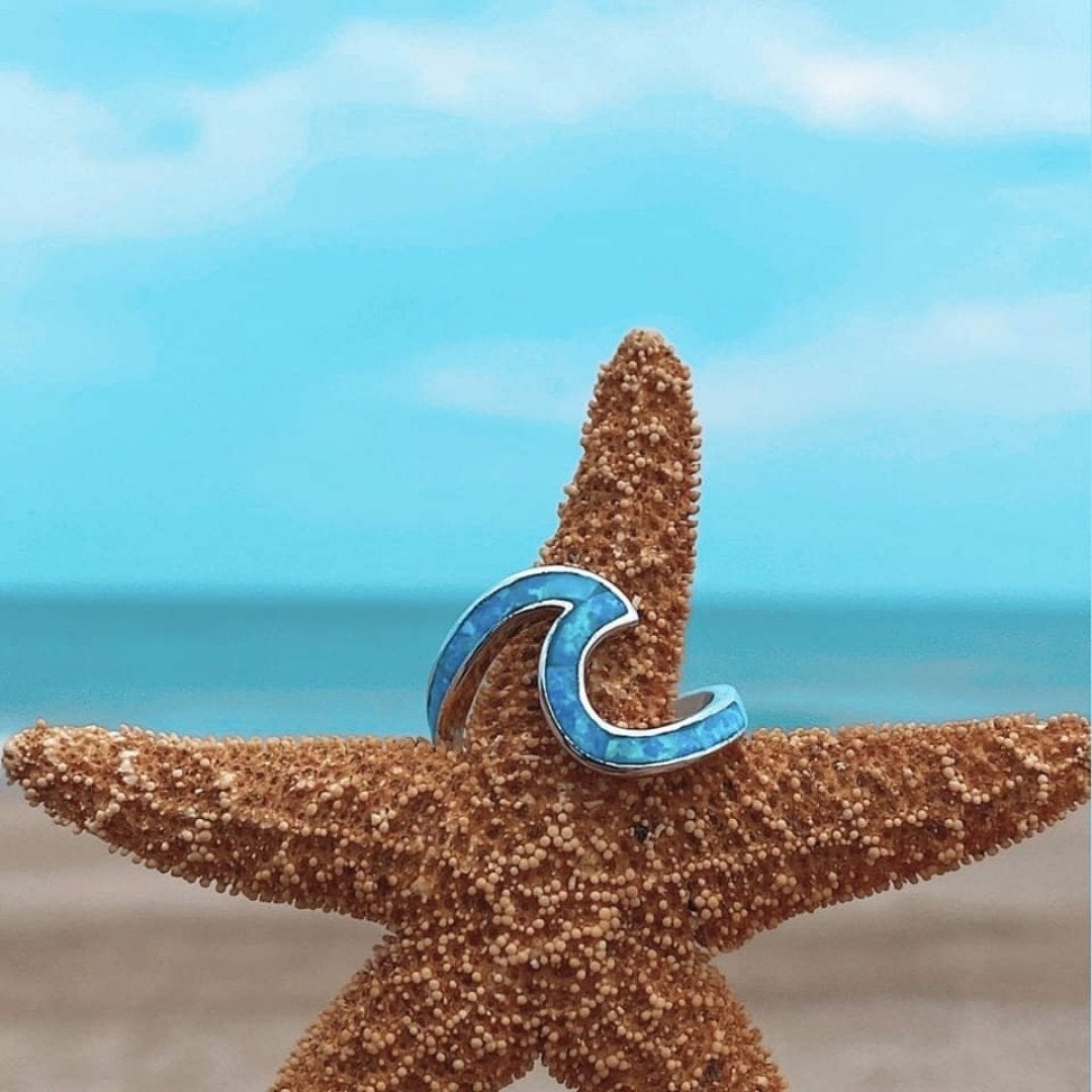 Anillo ola del océano en ópalo y plateado