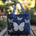 Bolso con mariposa plateada