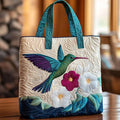 Bolso acolchado con colibrí y flor blanca