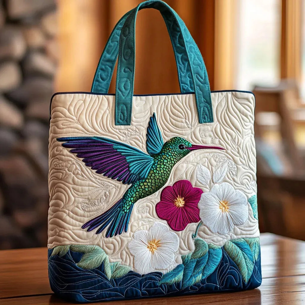Bolso acolchado con colibrí y flor blanca