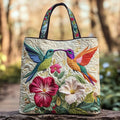 Bolso acolchado con colibrí y flores blancas