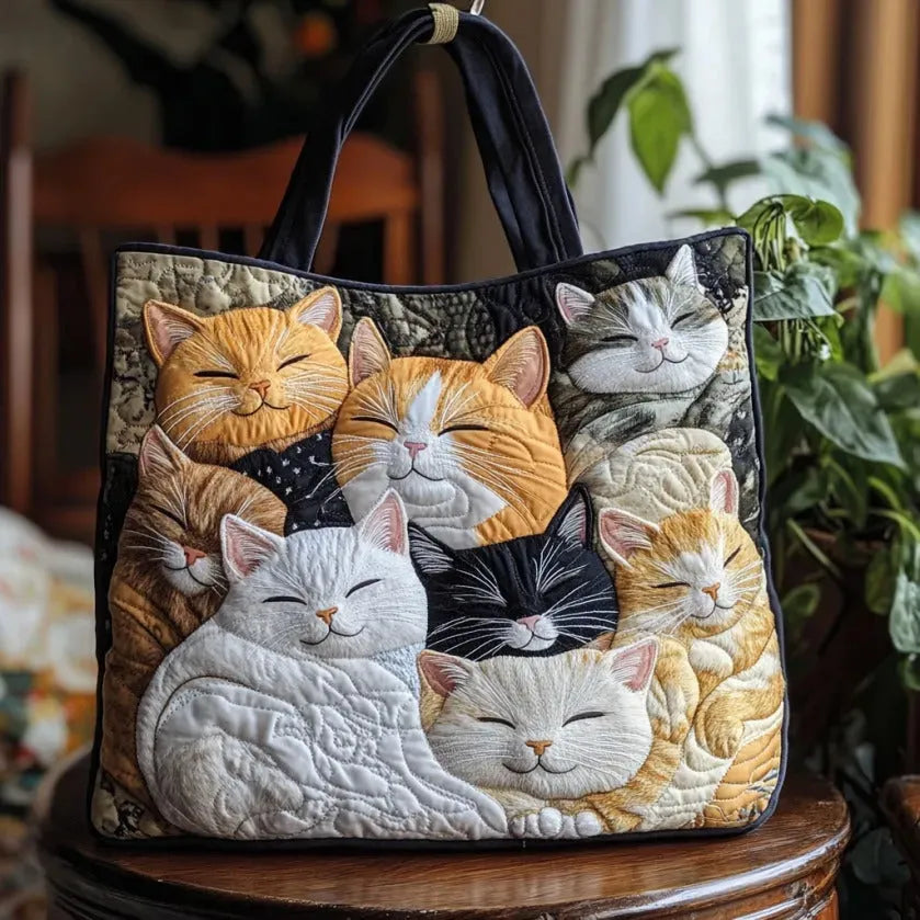 Bolso acolchado con gatitos dormidos