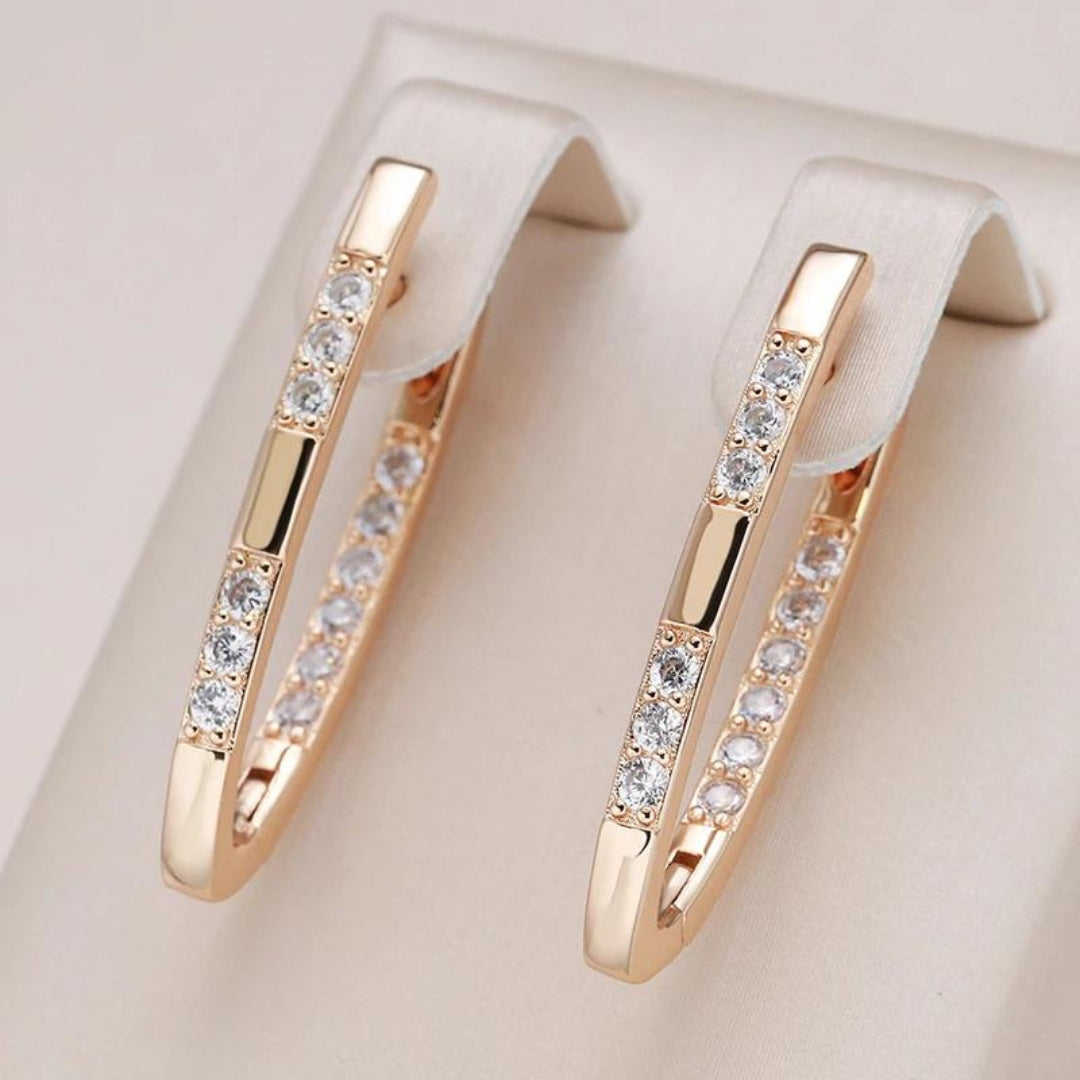 Pendientes elegantes de circonita en dorado