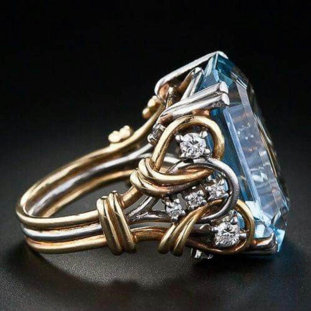 Anillo vintage dorado de capas con circonita azul