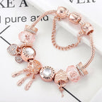 Pulsera atrapasueños rosa con colgantes en tono plateado