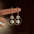 Pendientes lujosos con perlas y circonitas
