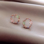 Pendientes de flor de cristal en tono oro rosa