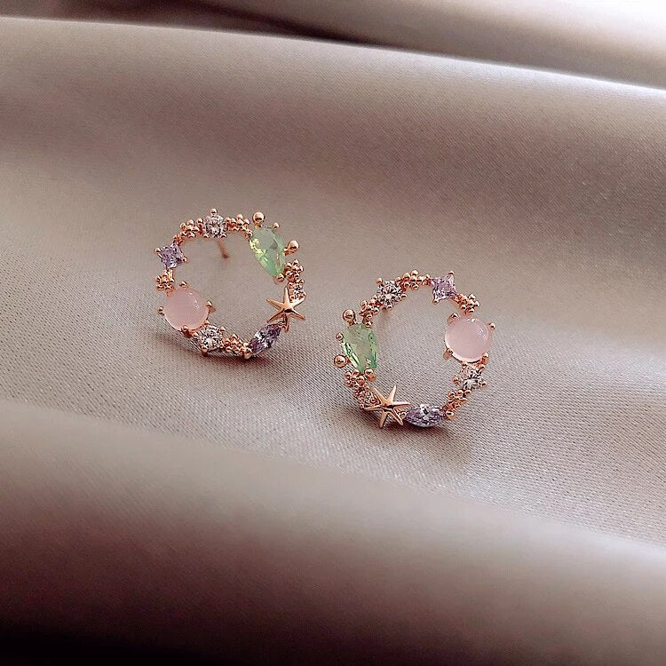 Pendientes de flor de cristal en tono oro rosa