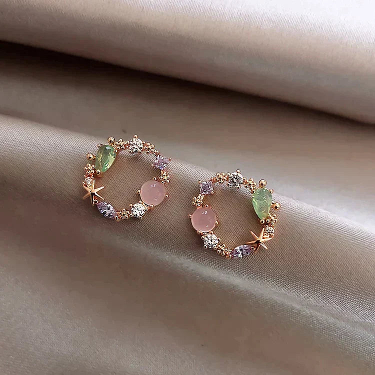 Pendientes de flor de cristal en tono oro rosa