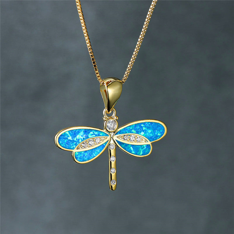 Collar de libélula en dorado con ópalo