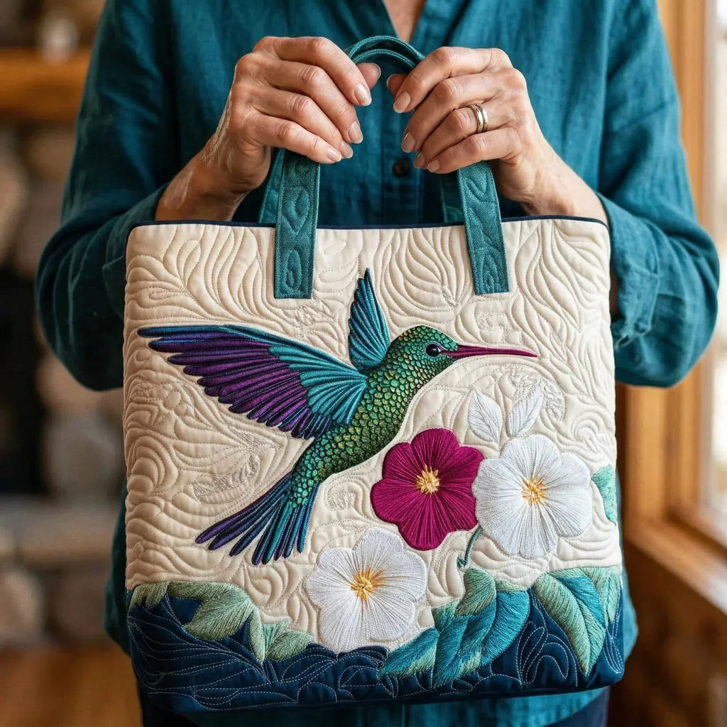 Bolso acolchado con colibrí y flor blanca