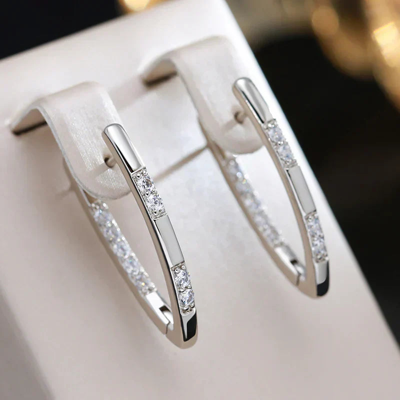 Pendientes elegantes de circonita en dorado