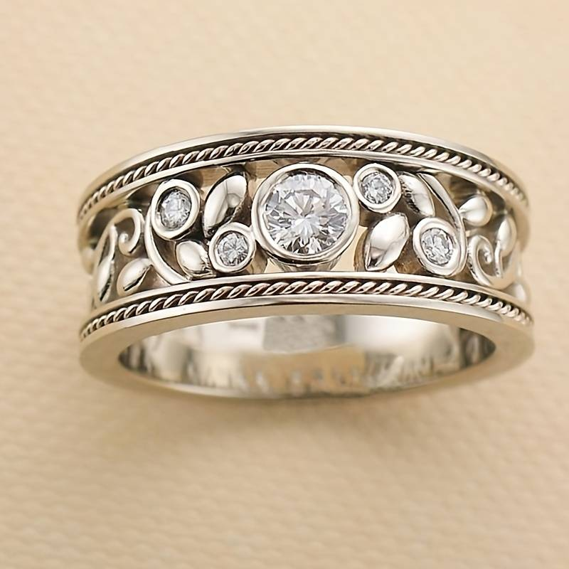 Anillo vintage plateado con circonita