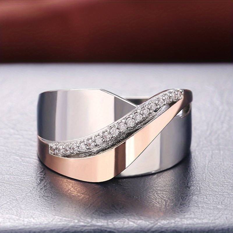 Anillo vintage con circonita en tono oro rosa y plateado