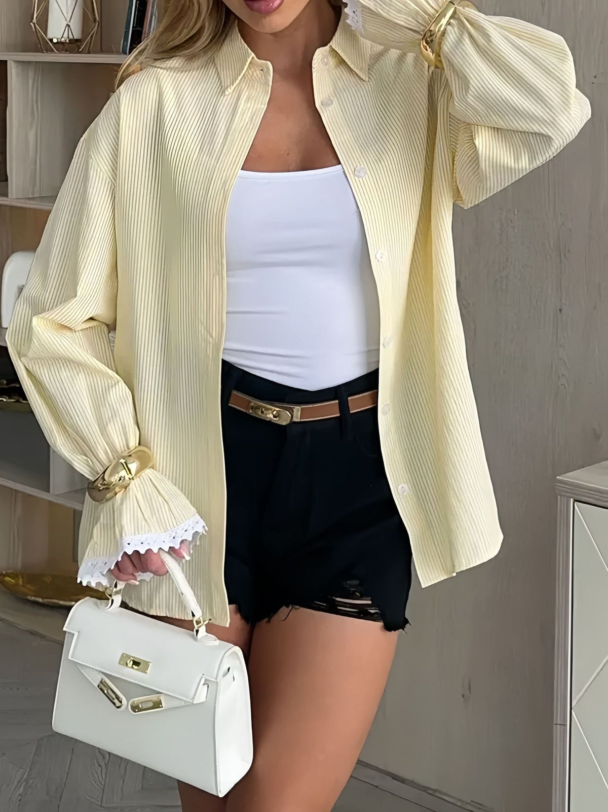 Noelle | Blusa de rayas elegante con puños finos