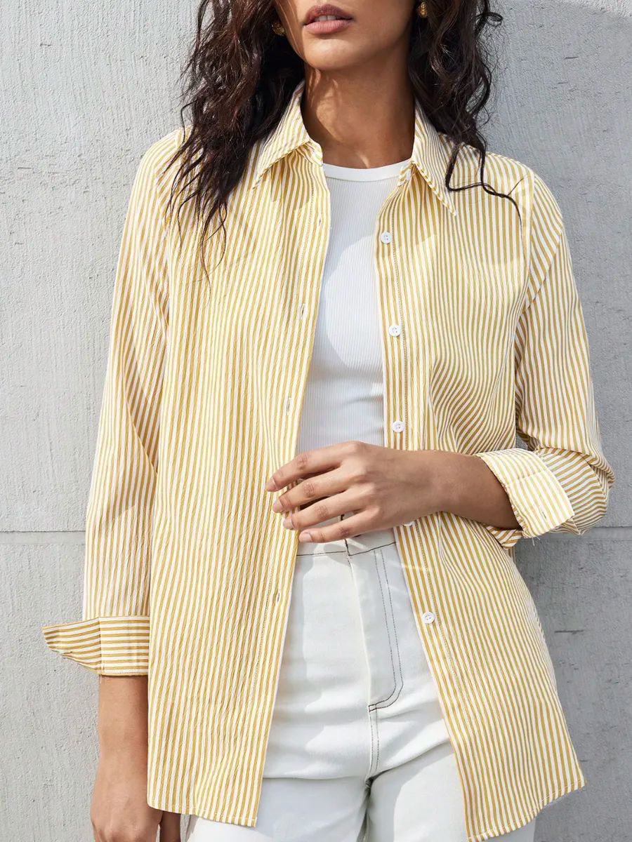 Noelle | Blusa de rayas elegante con puños finos