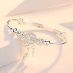 Pulsera atrapasueños ajustable en tono plateado