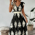 Candela | Vestido largo de estilo barroco con escote en pico